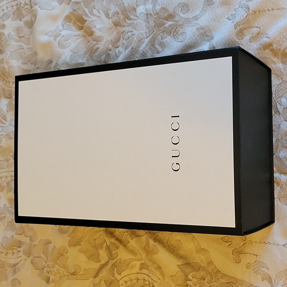 Medium empty Guccu box with dust bag,  tissue paper and responsibility booklet.